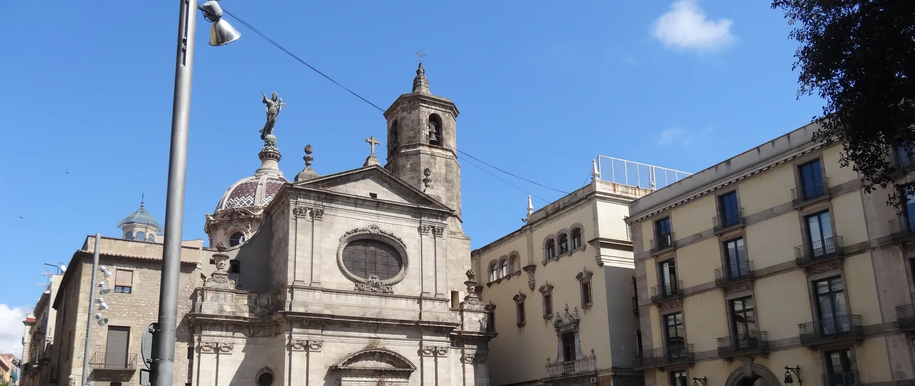 The Baroque front and bell tower on Plaça de la Mercè.